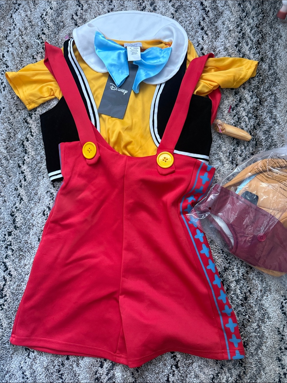 Disney Red Pinocchio-Inspired Costume with Yellow and Blue Accents